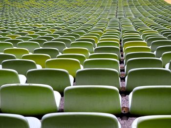 Empty green stadium seats