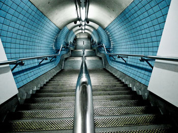 Illuminated staircases through tunnel