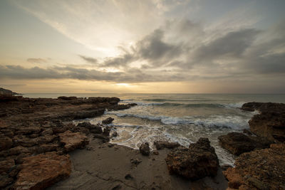 Scenic view of sea against sky during sunset