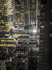 High angle view of illuminated modern buildings in city