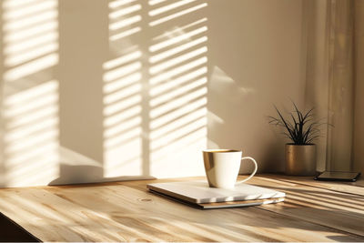 Coffee cup on table at home