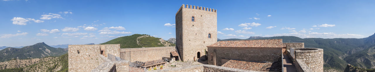 Low angle view of old ruins against sky