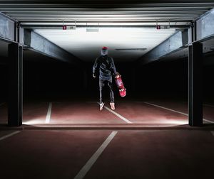 Blurred motion of people walking on tiled floor