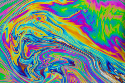 Full frame shot of multi colored water surface