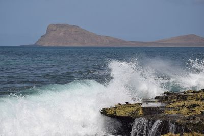 Scenic view of sea against clear sky