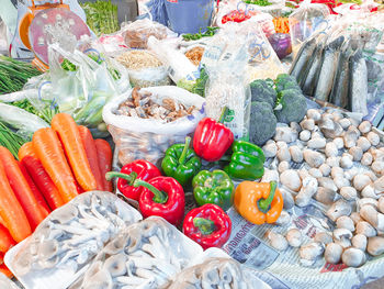 Fruits and vegetables on display at market stall