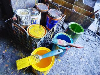 High angle view of various paintbrushes on table