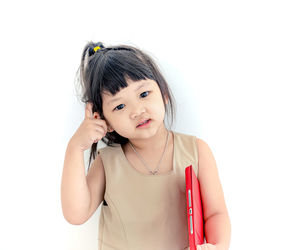 Portrait of a smiling girl over white background