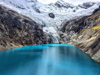 Scenic view of lake by mountains