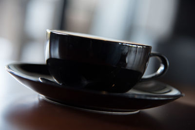 Close-up of tea cup on table