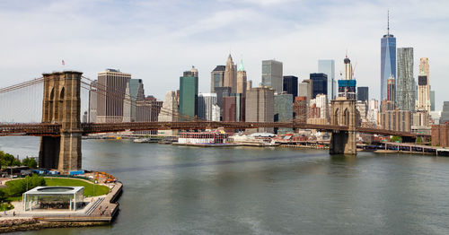 View of the brooklyn bridge with lower manhattan in the distance