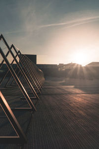 Geometric shapes artwork on concrete ground and sunbeam