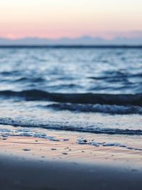 Scenic view of sea at sunset