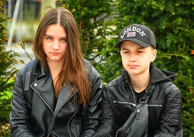 Portrait of young woman standing outdoors
