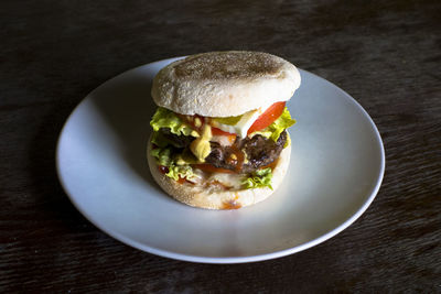 Close-up of beef burger in plate