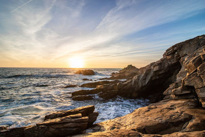 Scenic view of sea against sky during sunset