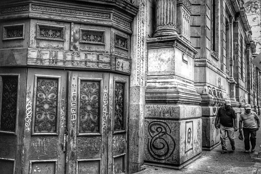 architecture, built structure, building exterior, art and craft, art, creativity, ornate, building, entrance, human representation, door, window, facade, history, carving - craft product, day, arch, gate, text