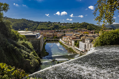 Bridge over river against sky
