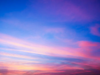 Low angle view of dramatic sky during sunset