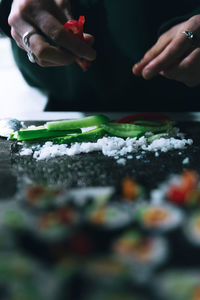 Close-up of person preparing food