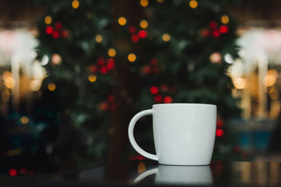 Close-up of coffee cup on table