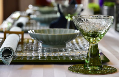 Close-up of drinking glass on table