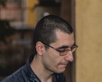 Portrait of young man wearing eyeglasses