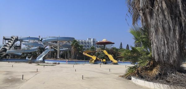 View of swimming pool against clear blue sky