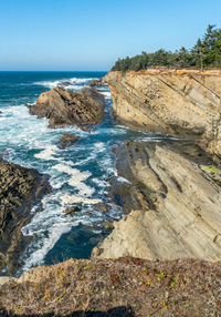 A view of the rugged shoreline at shore acres state park in oregon state.