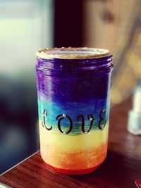 Close-up of glass of jar on table