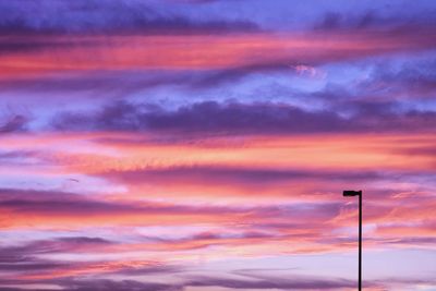 Low angle view of dramatic sky during sunset