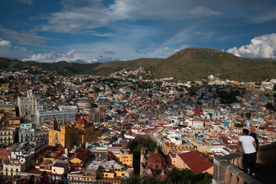 Aerial view of cityscape against sky