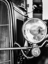 Close-up of headlight of vintage car