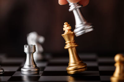 Close-up of chess pieces against blurred background