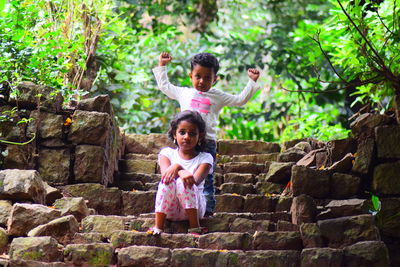 Portrait of child on stone steps