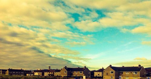 Cityscape against sky during sunset