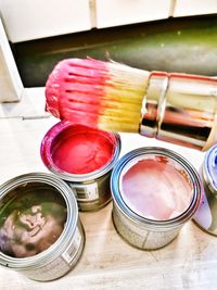 High angle view of multi colored jar on table
