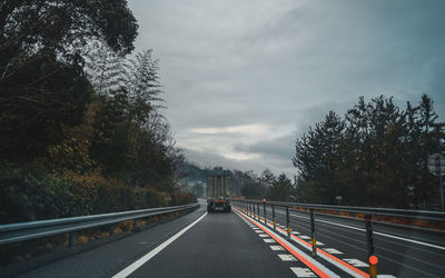 Road leading towards sky