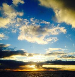 Scenic view of sea at sunset