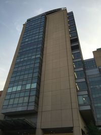 Low angle view of modern building against sky