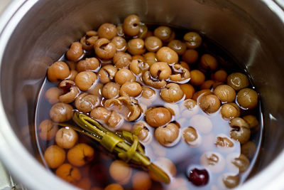 Directly above shot of longan sweet in container