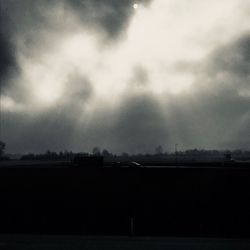 Scenic view of silhouette landscape against sky