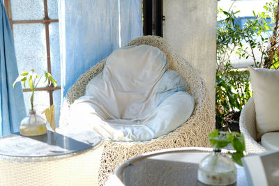 White cushion pillow on chair sofa seat at patio at home