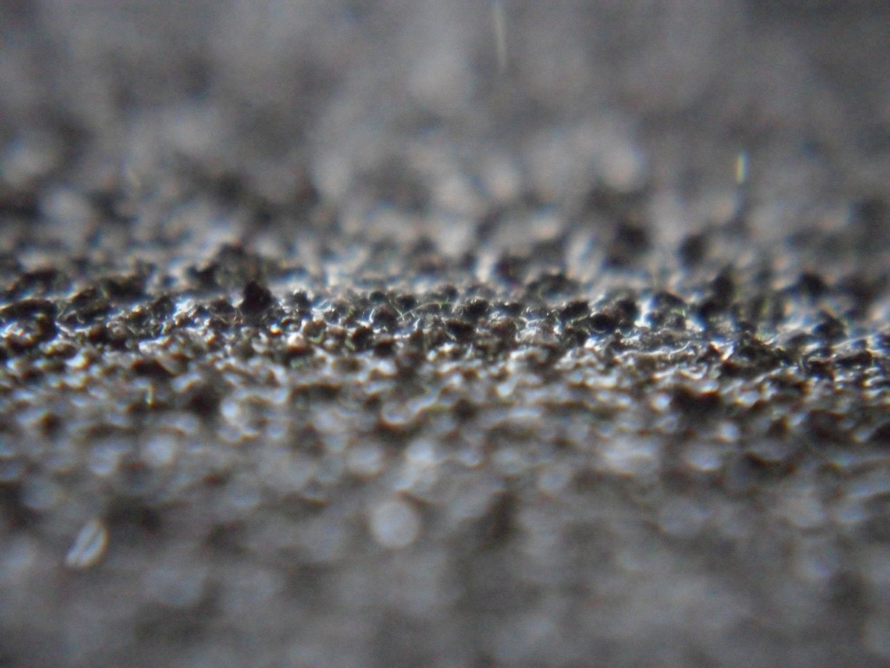 FULL FRAME SHOT OF SNOW COVERED SURFACE