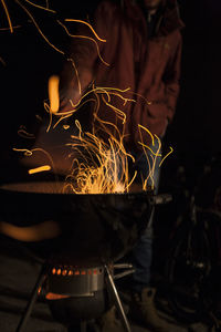 Close-up of fire on barbecue grill