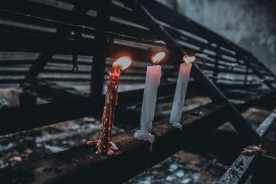 High angle view of burning candles