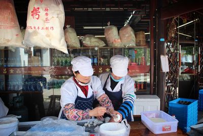 People working at store