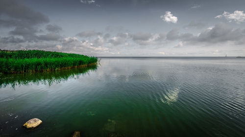 Scenic view of lake against sky