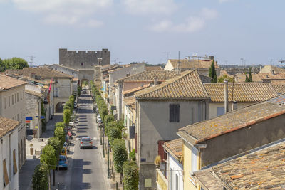 High angle view of street amidst buildings in city