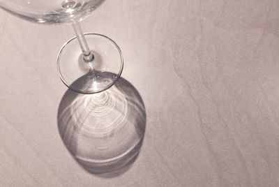 High angle view of wine glass on table